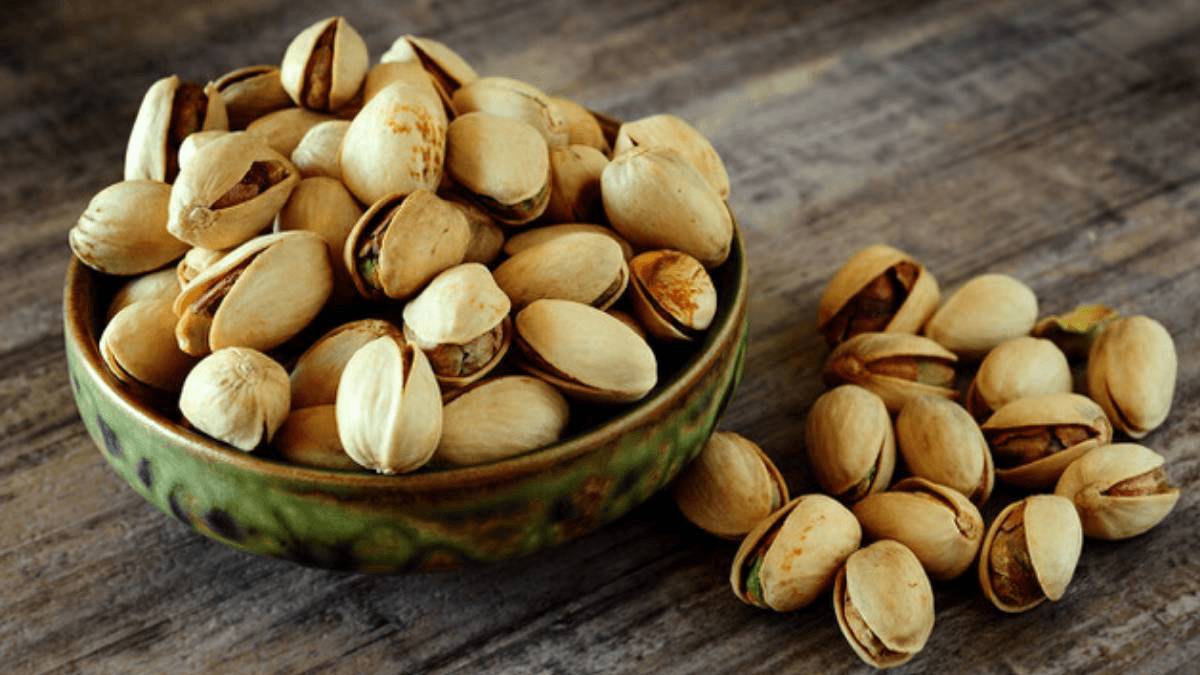 Healthy raw California pistachios in a bowl